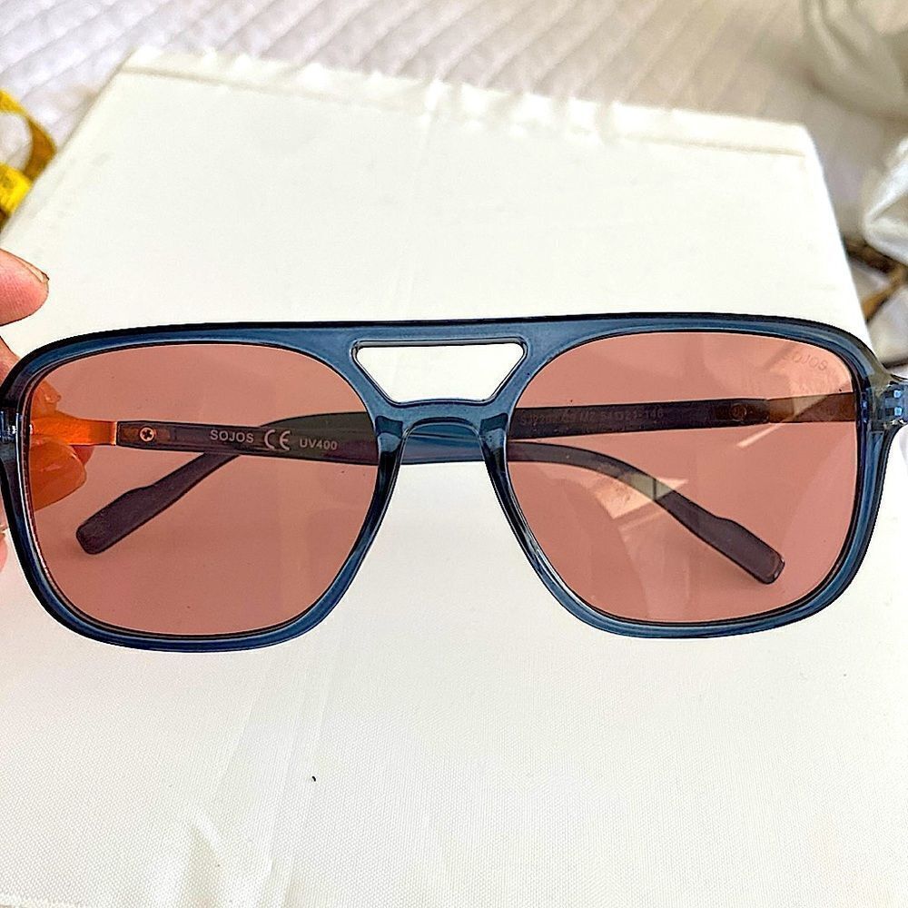 Blue frame sunglasses with rose colored lenses new with Case